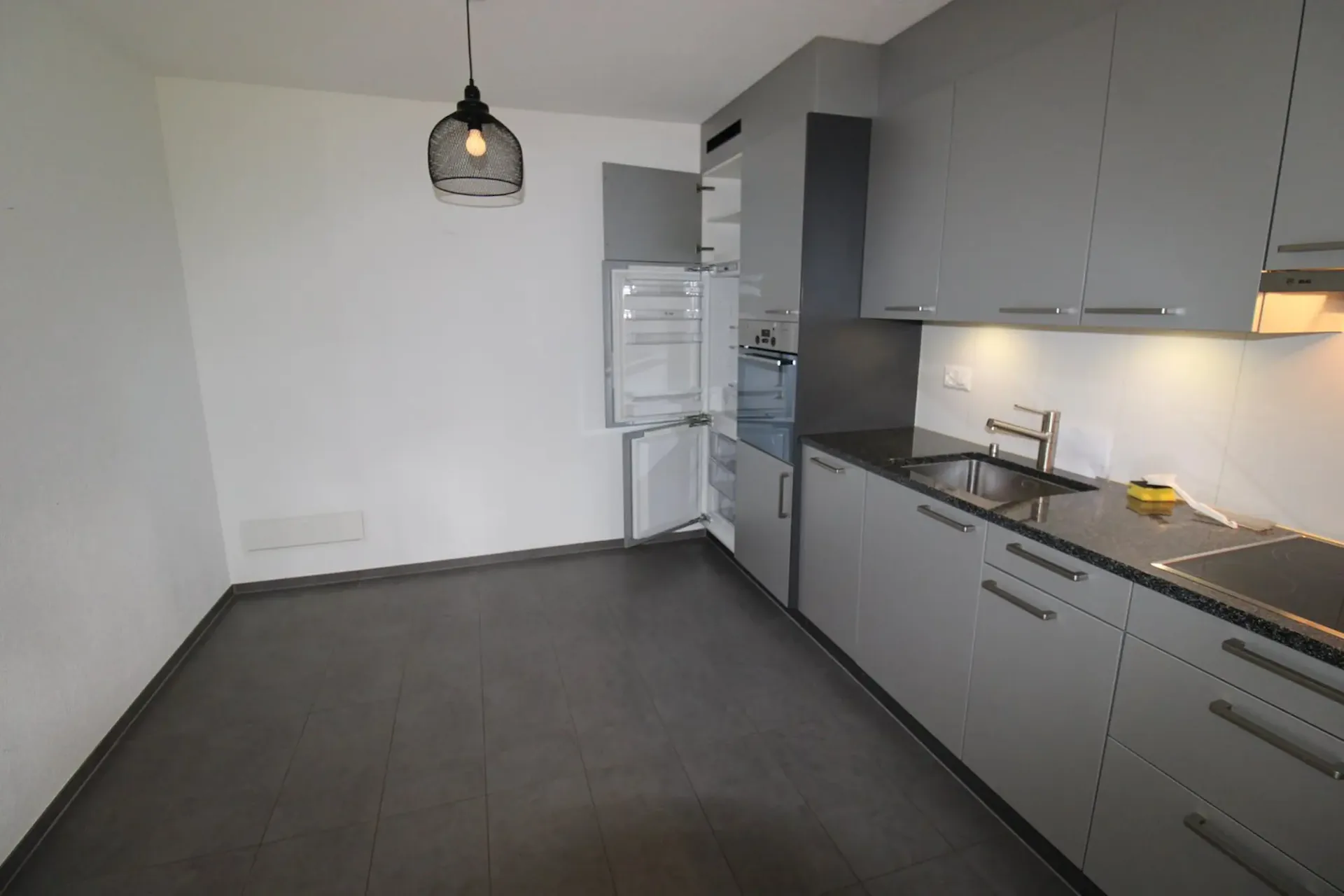 Moderne Wohnung mit Gartensitzplatz