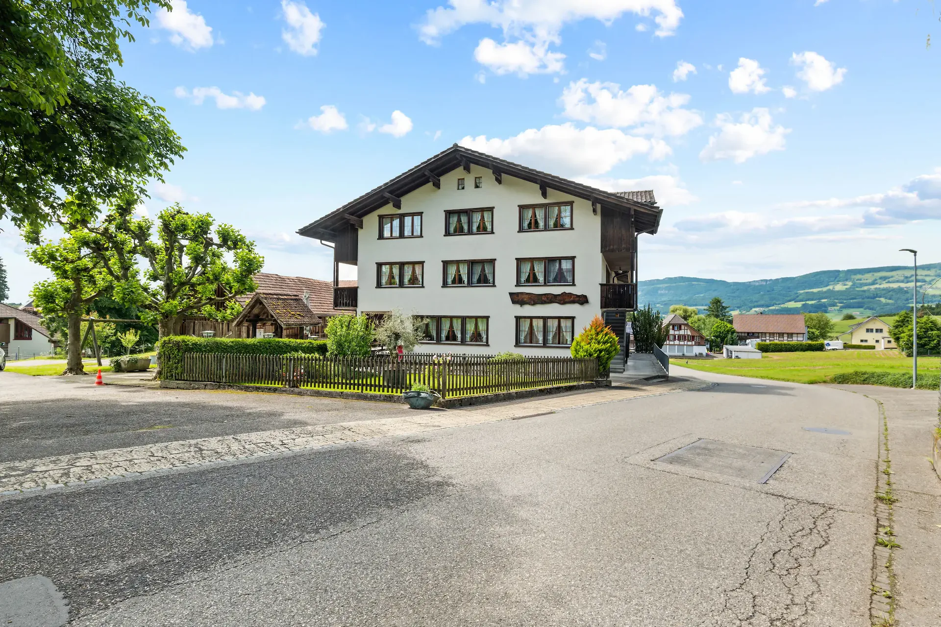 Multi-family house with additional building land