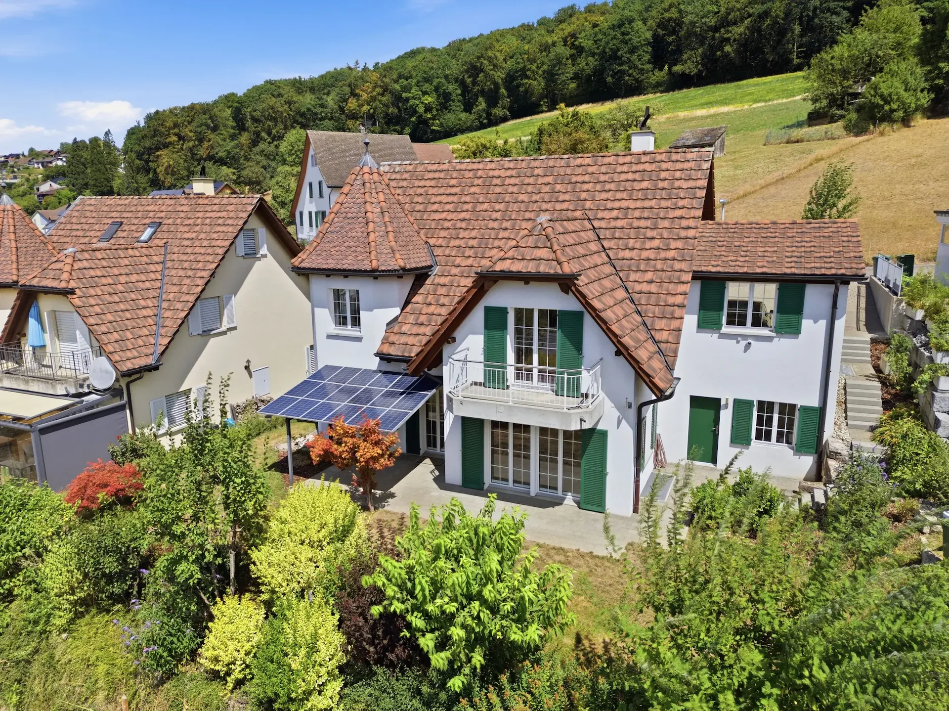 Exclusive country house villa with tower on sunny southwest slope, just 30 minutes to Zurich HB