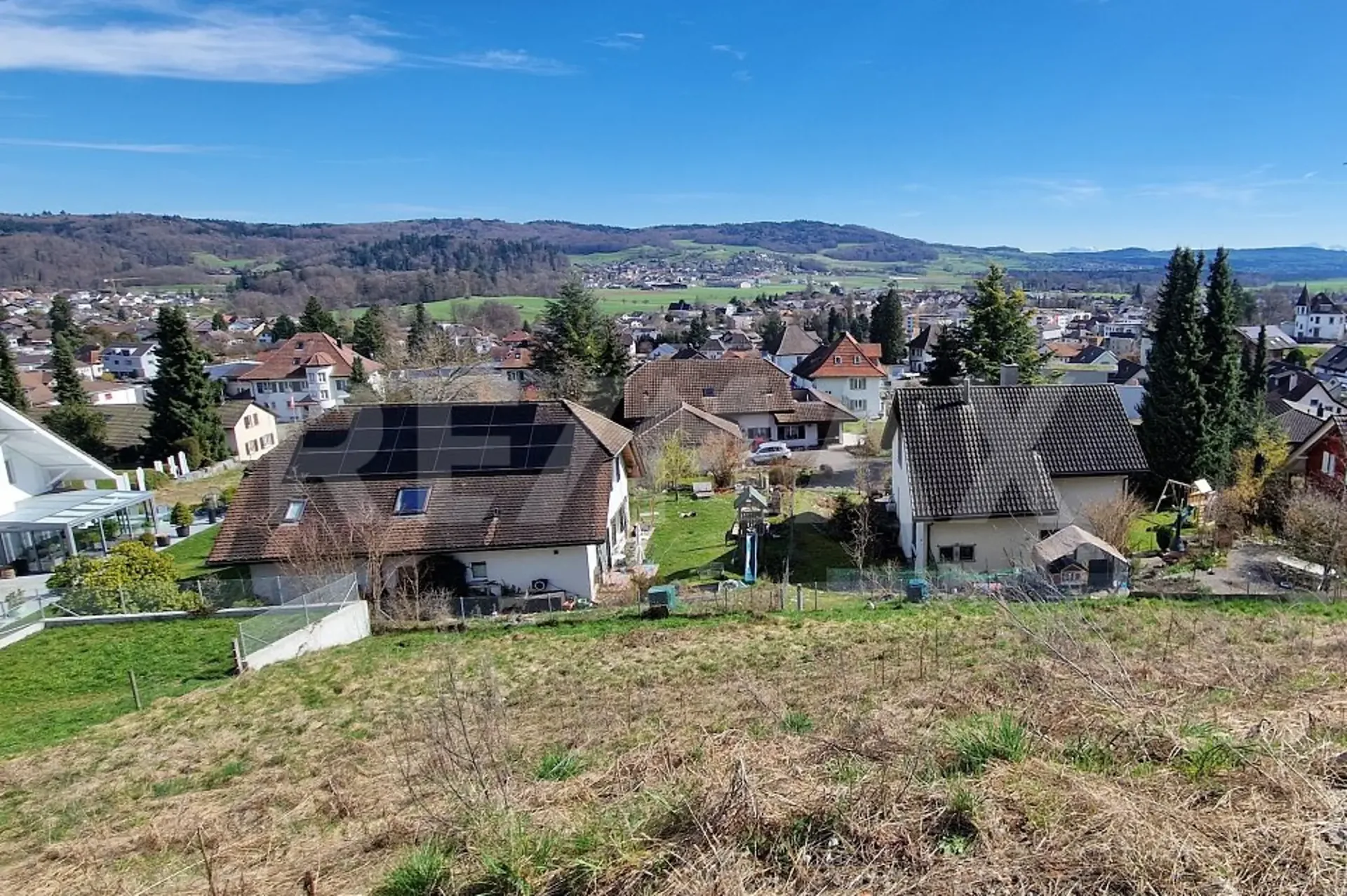 Terreno edificabile 1'143 m², vicino all'A1 e a Lenzburg, posizione in pendio con vista panoramica, ad esempio per case unifamiliari, case a schiera, case a fila
