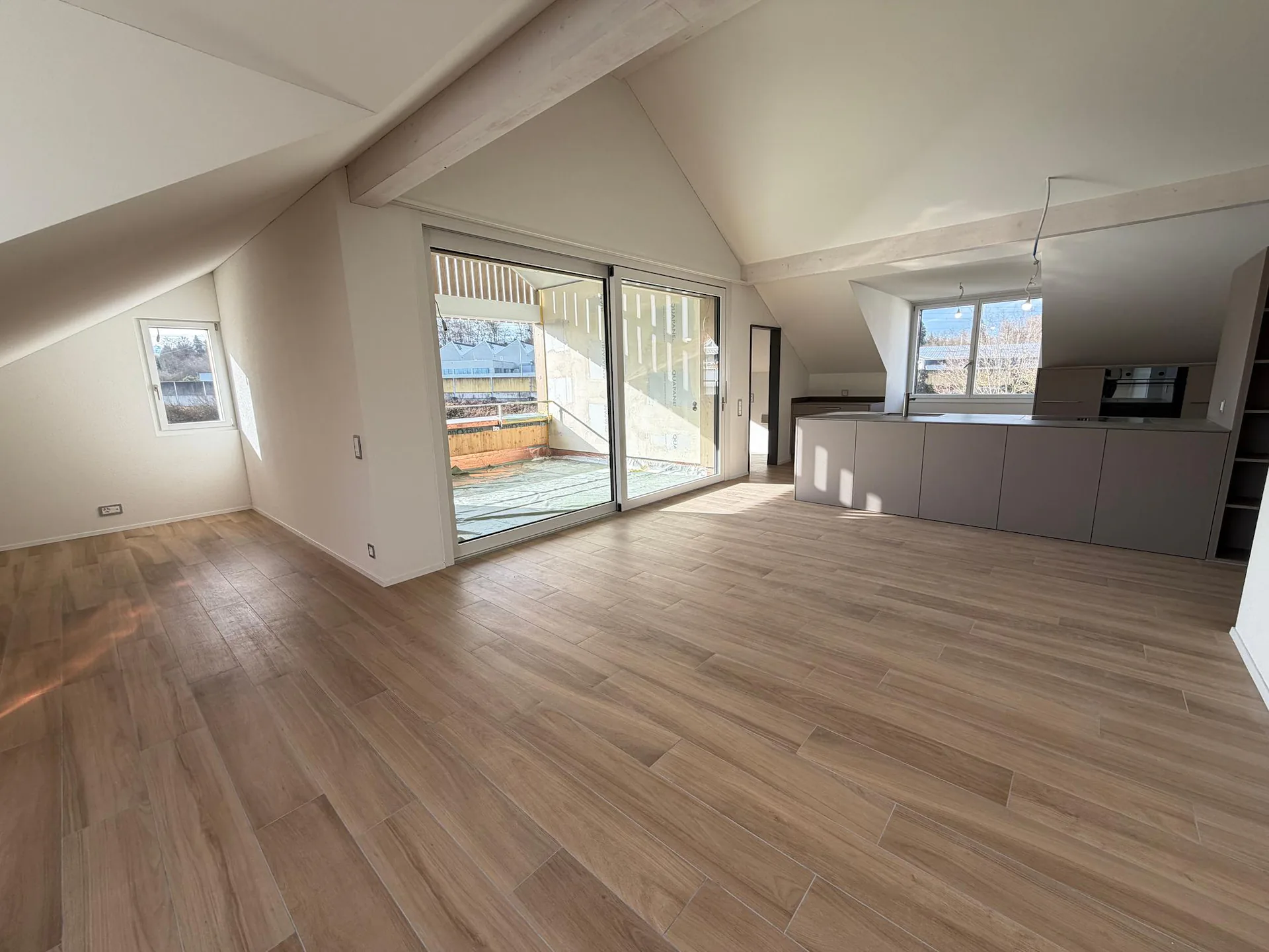 Appartement de charme 3.5 pièces en mansarde dans un immeuble neuf 103 m² avec beaucoup de lumière & charme