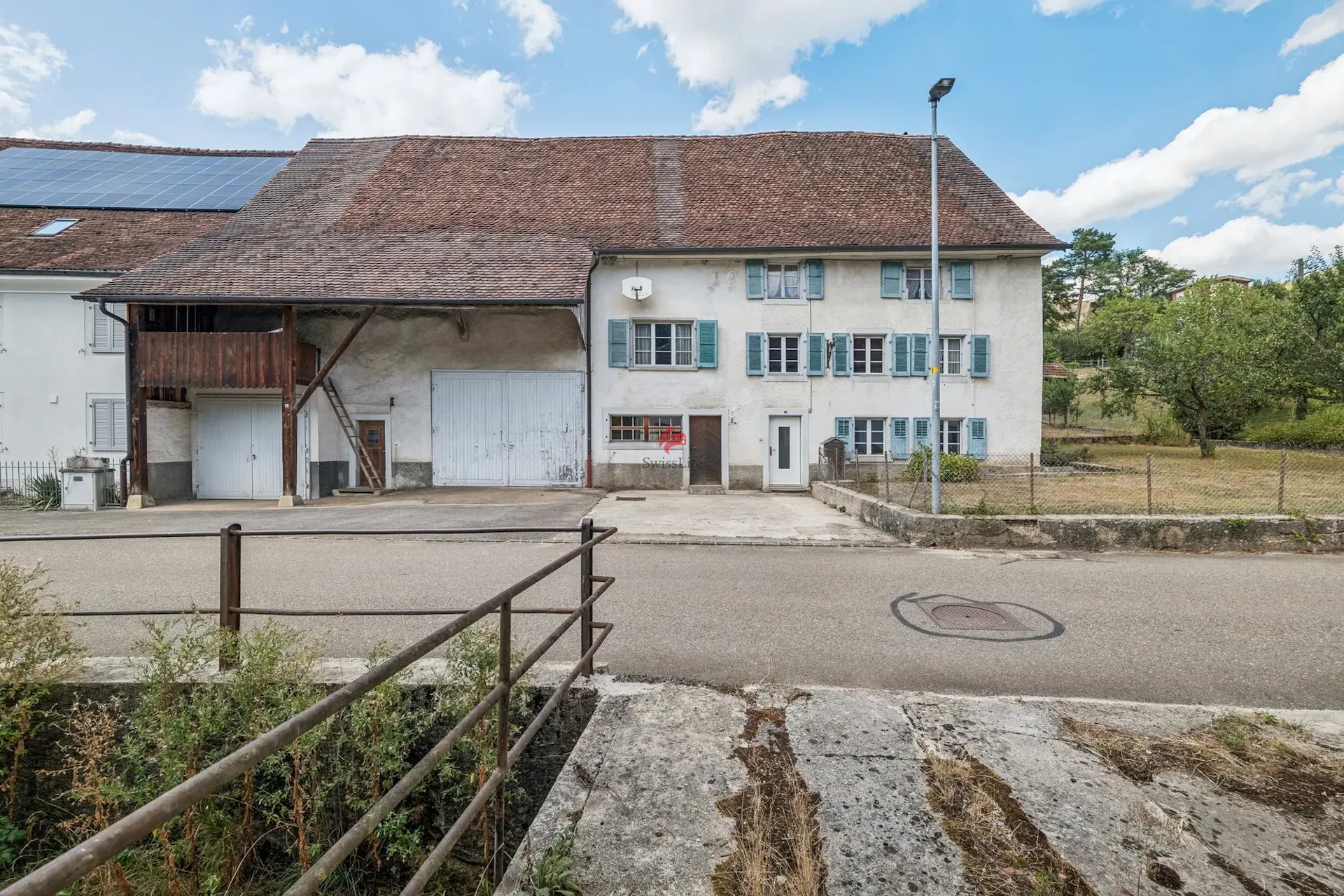 Antica fattoria di carattere con potenziale nel centro del villaggio