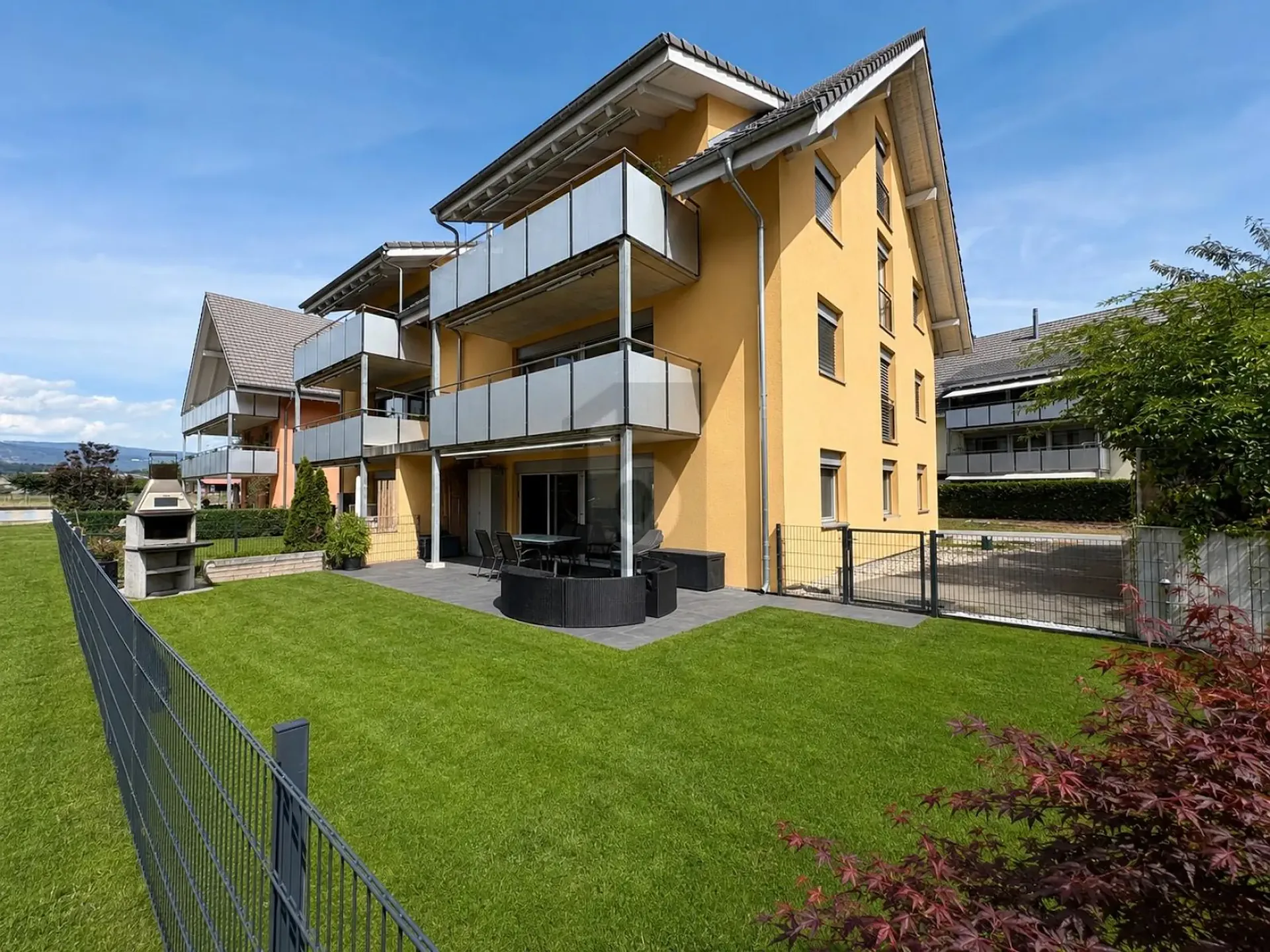 Modern with large garden and seating area
