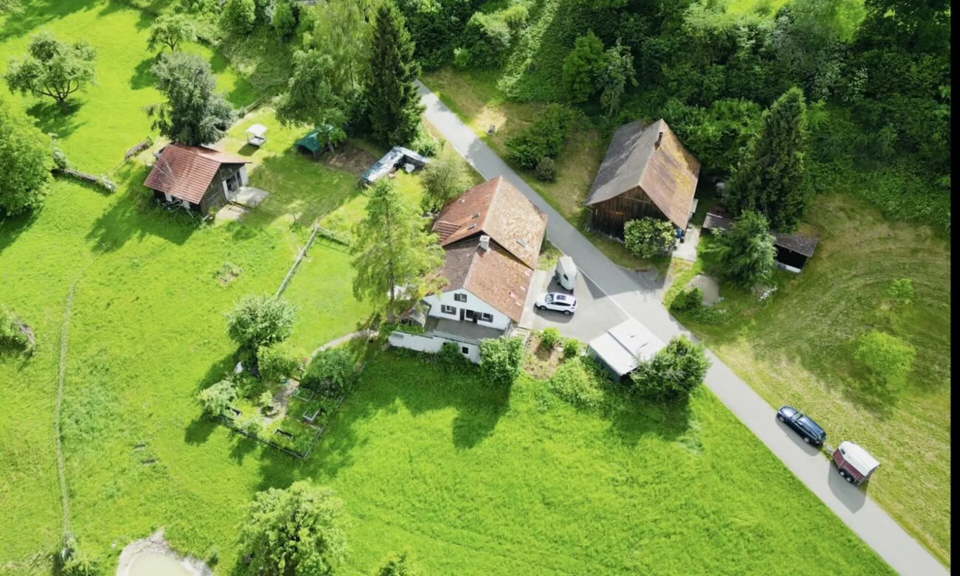 Large detached 7.5-room farmhouse for horse lovers or small animal keepers! Horse stalls, outbuilding, forest, and meadows....