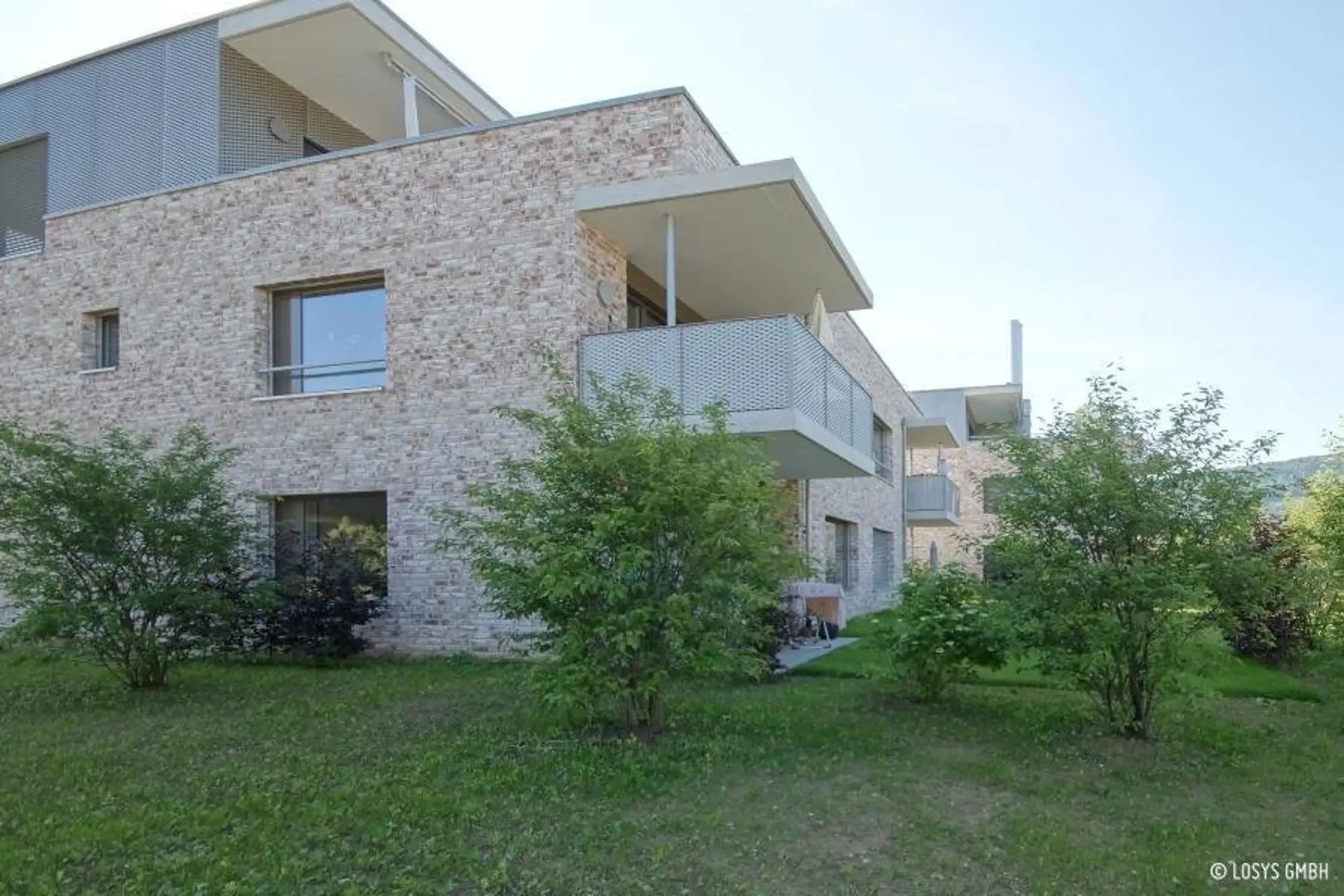 Moderne et Centrale : Appartement 4.5 Pièces dans un Environnement Vert