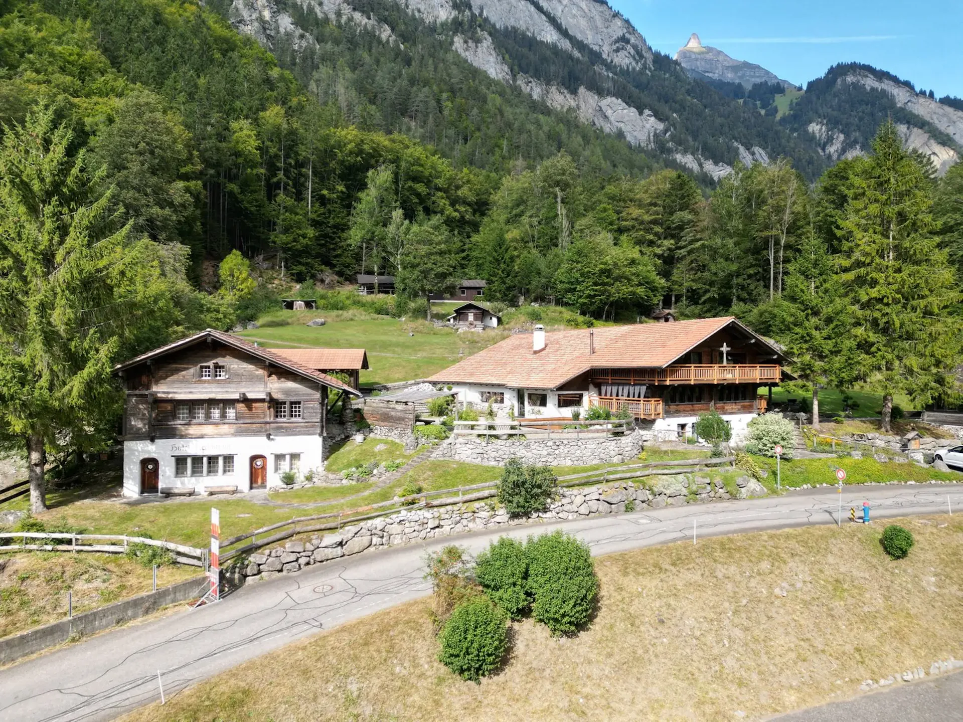 Diverse outbuildings hotel with 8 rooms, garages, chalet, old cheese dairy, event location, building land etc