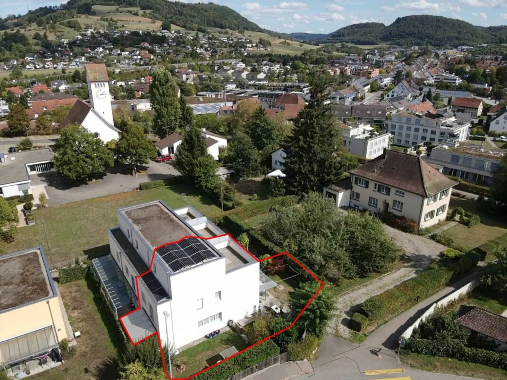 Modern semi-detached family house with garden