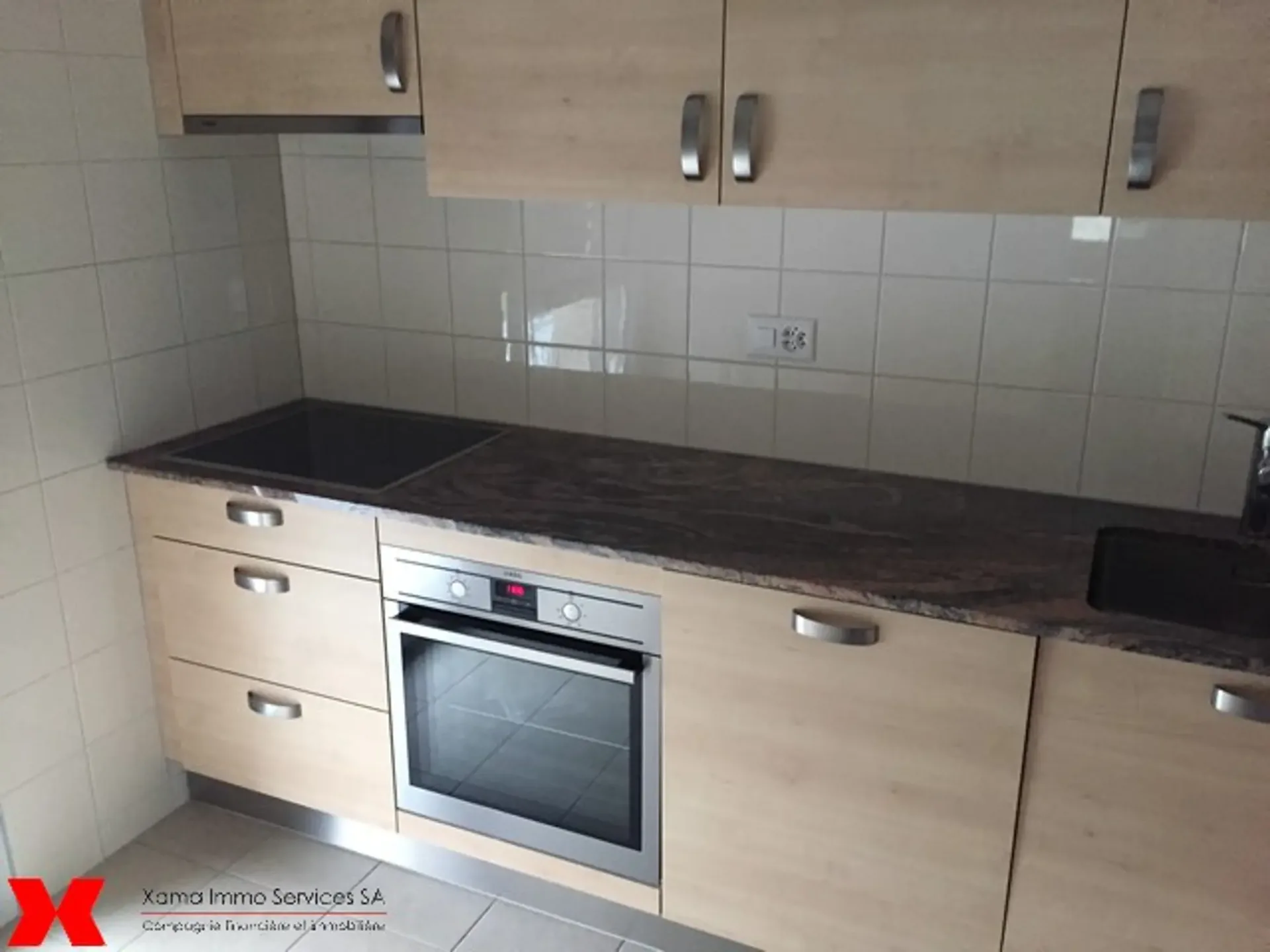 Spacieux appartement de 5.5 pièces avec balcon au 1er étage
