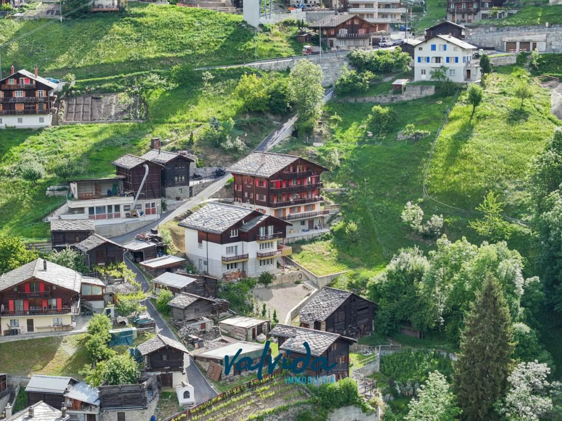 Family-friendly two-family house with development potential in Staldenried