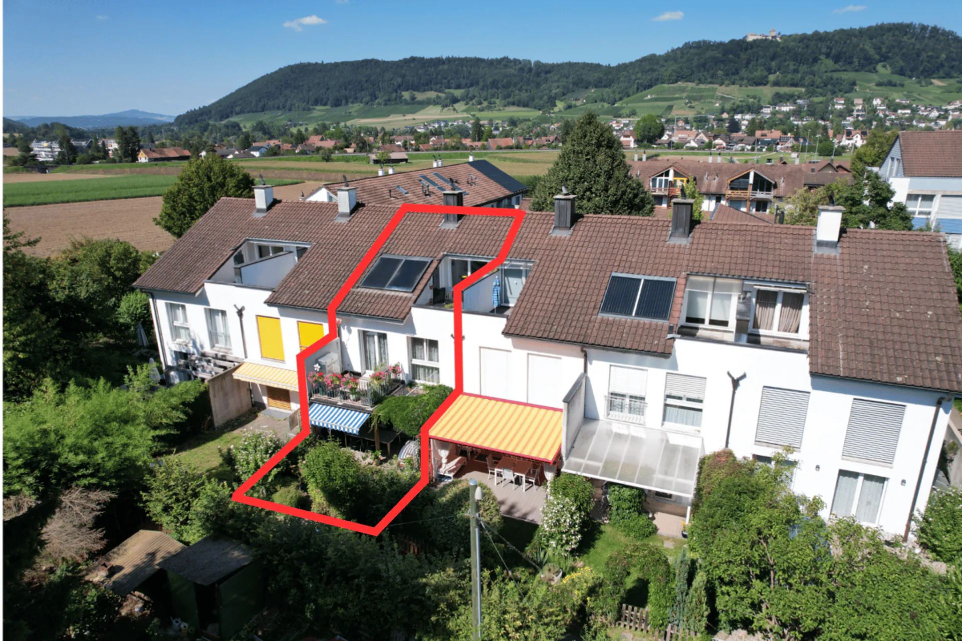 Casa a schiera familiare con giardino soleggiato