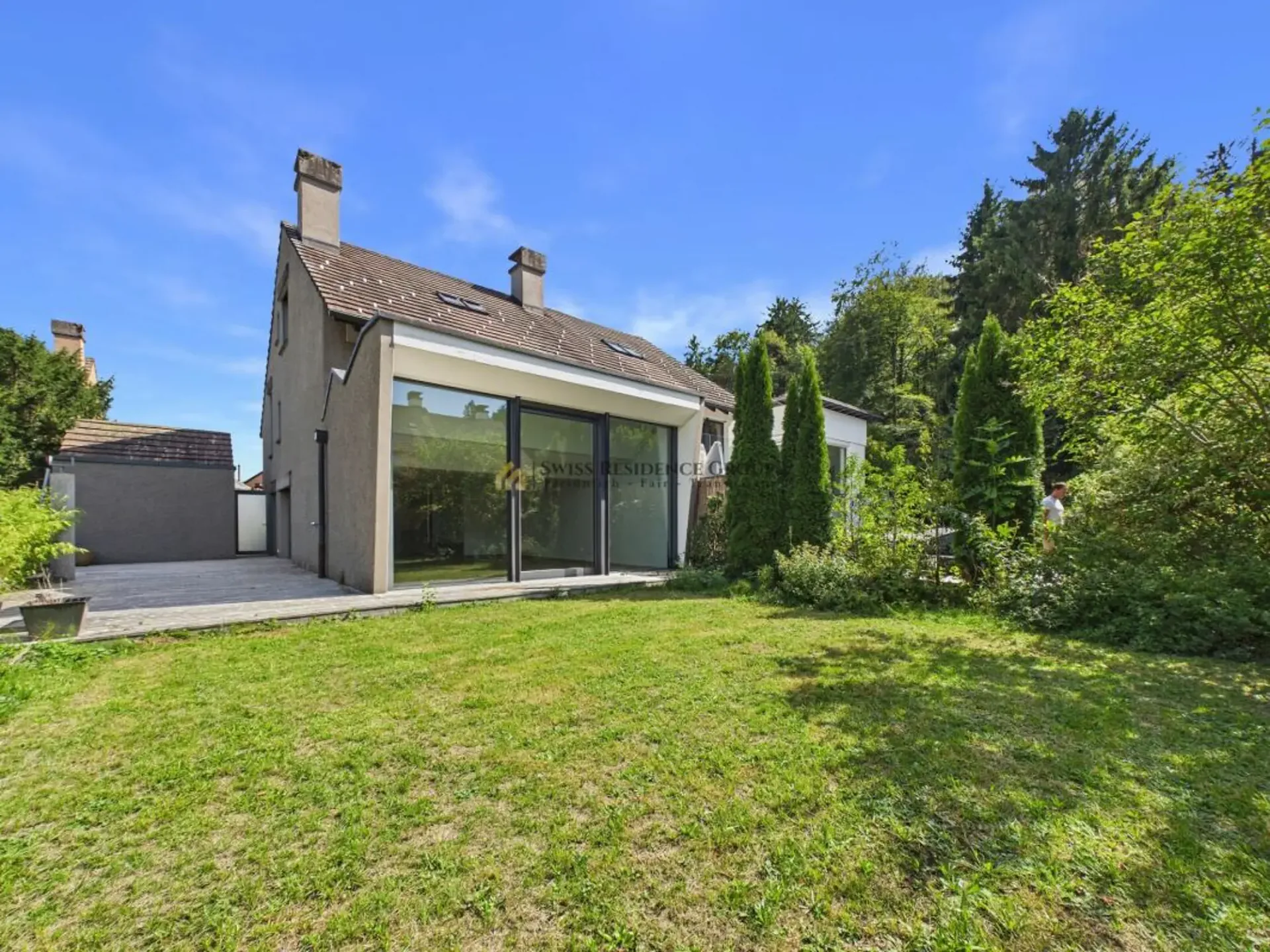 Wohntraum für Familien, stilvolles Haus mit Garten in Ebmatingen